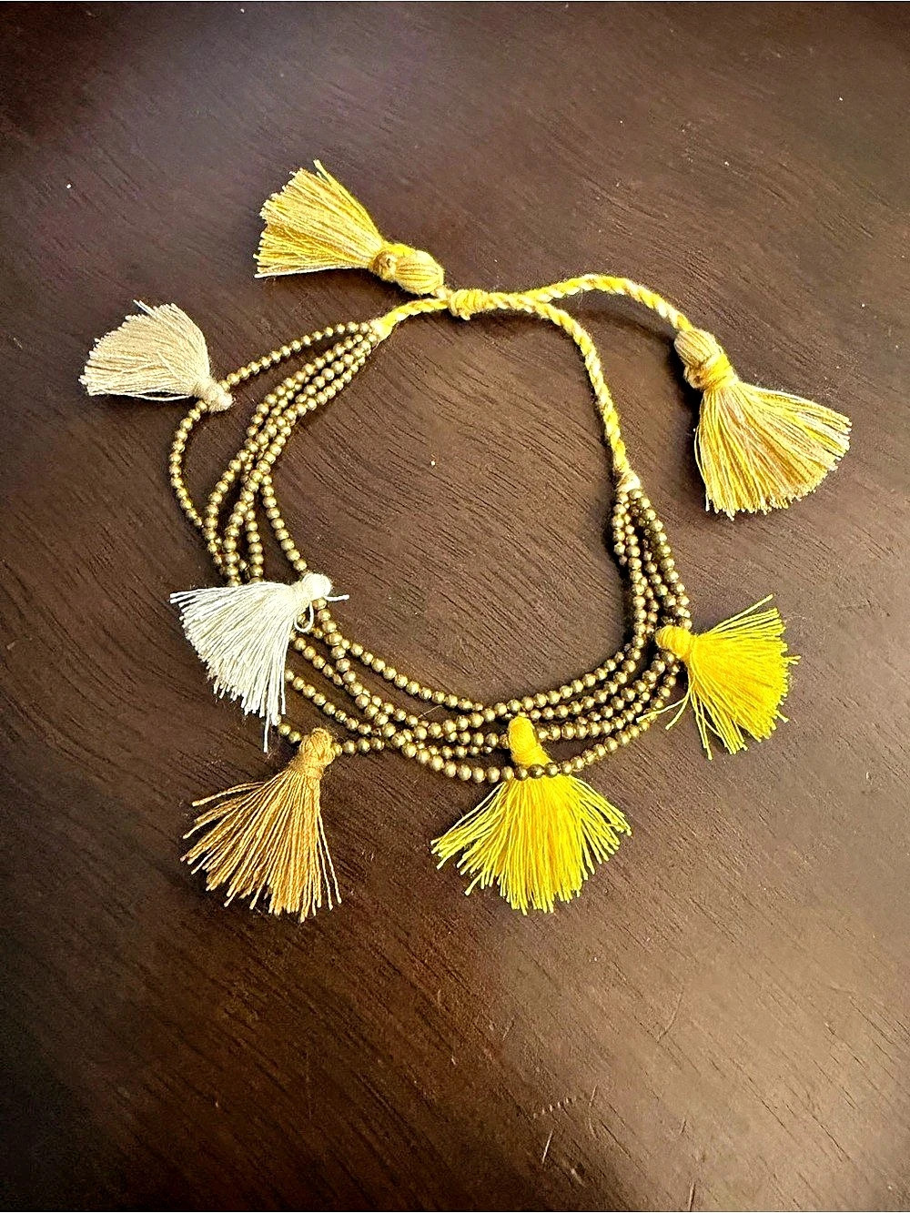 Anthropologie - Tassel Bracelet in Yellow & Gold - Like New